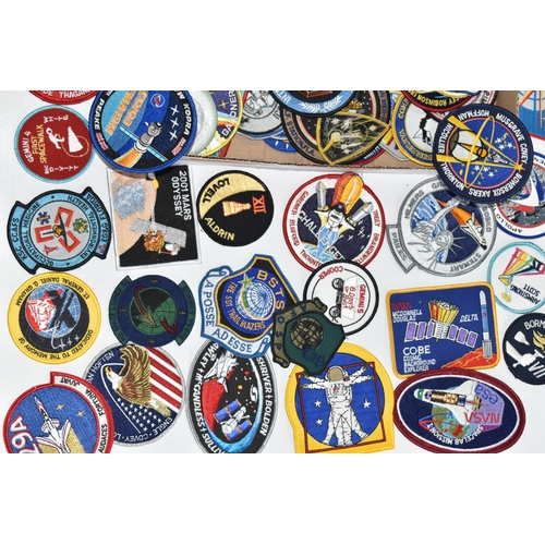 255 - A BOX OF MOSTLY AMERICAN SPACE MISSION RELATED CLOTH BADGES, to include crew name badges, Gemini 4 f... 