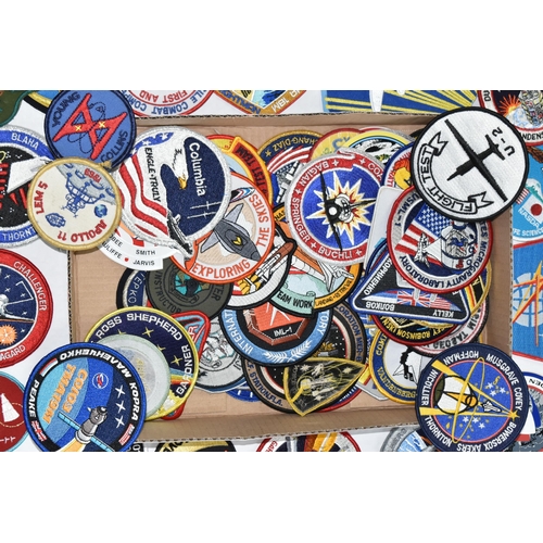 255 - A BOX OF MOSTLY AMERICAN SPACE MISSION RELATED CLOTH BADGES, to include crew name badges, Gemini 4 f... 