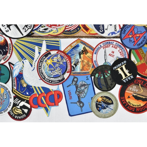 255 - A BOX OF MOSTLY AMERICAN SPACE MISSION RELATED CLOTH BADGES, to include crew name badges, Gemini 4 f... 