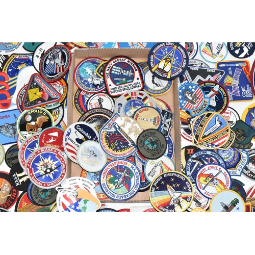 255 - A BOX OF MOSTLY AMERICAN SPACE MISSION RELATED CLOTH BADGES, to include crew name badges, Gemini 4 f... 