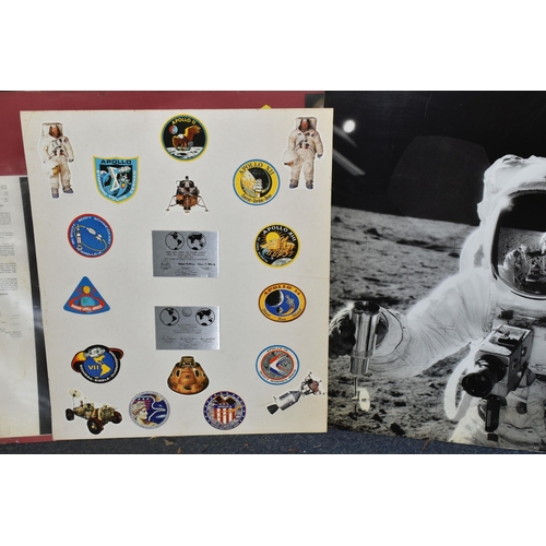 282 - A PRINT OF ALAN BEAN HOLDING A ROCK SAMPLE CONTAINER', reflected in his visor is the photographer Pe... 