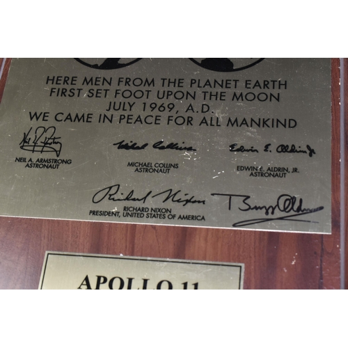 303 - A LIMITED EDITION APOLLO 11 PLAQUE SIGNED IN FELT TIP PEN BY BUZZ ALDRIN, the plaque is a replica of... 