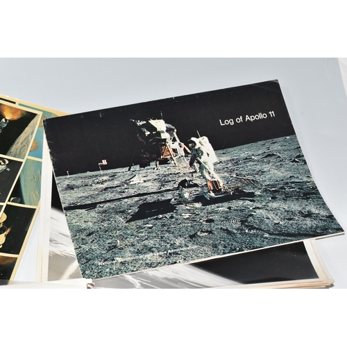 311 - A BOX OF DOCUMENTS RELATING TO THE APOLLO 11 MISSION comprising a number of black and white photos a... 