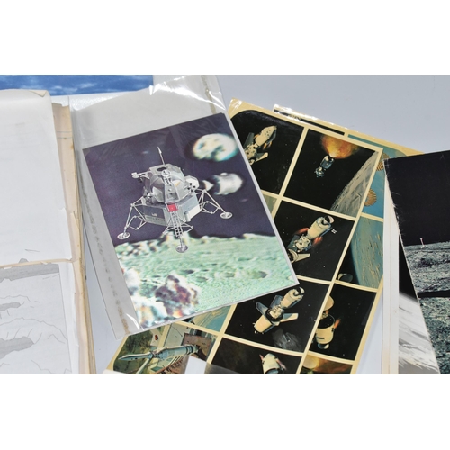 311 - A BOX OF DOCUMENTS RELATING TO THE APOLLO 11 MISSION comprising a number of black and white photos a... 