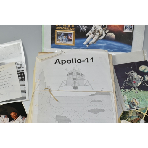 311 - A BOX OF DOCUMENTS RELATING TO THE APOLLO 11 MISSION comprising a number of black and white photos a... 