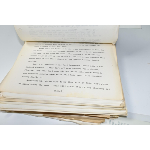 311 - A BOX OF DOCUMENTS RELATING TO THE APOLLO 11 MISSION comprising a number of black and white photos a... 