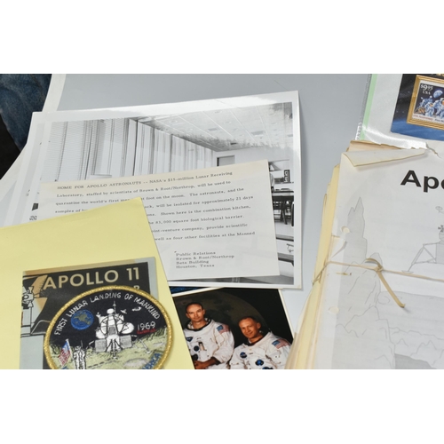 311 - A BOX OF DOCUMENTS RELATING TO THE APOLLO 11 MISSION comprising a number of black and white photos a... 