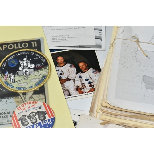 311 - A BOX OF DOCUMENTS RELATING TO THE APOLLO 11 MISSION comprising a number of black and white photos a... 