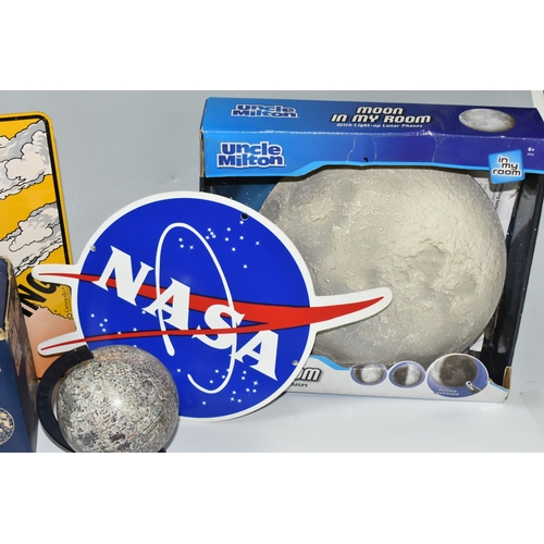 319 - A BOX OF SPACE SOUVENIRS to include a boxed Apollo Moon Flights Globe, a boxed Science Museum Soyuz ... 