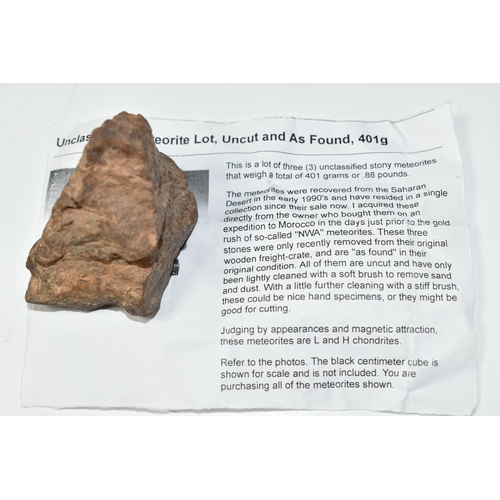 324 - AN UNCLASSIFIED NWA METEORITE SAMPLE, recovered from the Sahara Desert in the early 1990s, comes wit... 