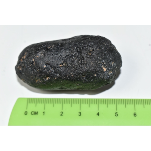 335 - AN INDOCHINITE TEKTITE FROM SOUTH-EAST ASIA, formed from the impact of a meteor, 66g