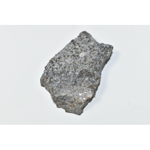 346 - A SLICE OF NWA 1930 METEORITE, found 2003, polished to both sides, 10.8g