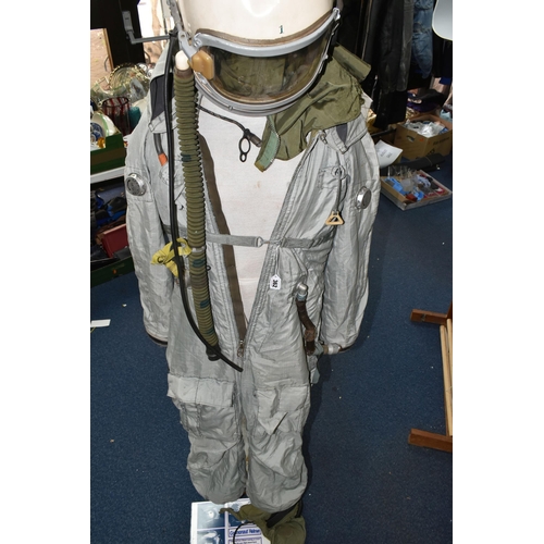 362 - A RUSSIAN MIG PILOTS FLYING SUIT AND HELMET, the helmet is signed by the pilot Alex Volkov, he went ... 