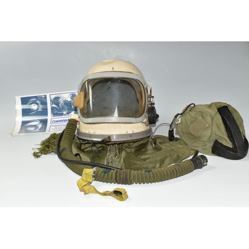 362 - A RUSSIAN MIG PILOTS FLYING SUIT AND HELMET, the helmet is signed by the pilot Alex Volkov, he went ... 