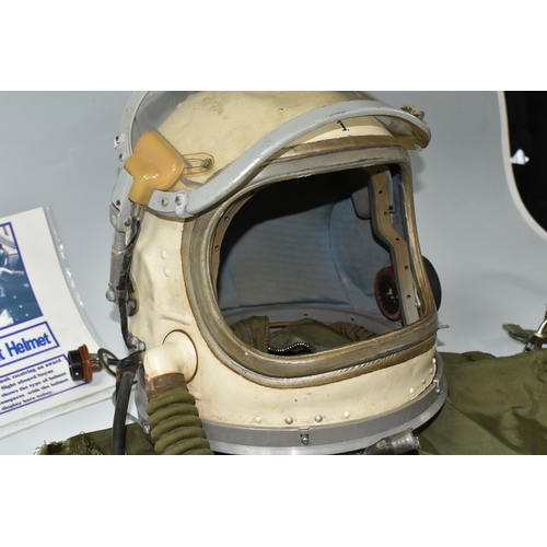 362 - A RUSSIAN MIG PILOTS FLYING SUIT AND HELMET, the helmet is signed by the pilot Alex Volkov, he went ... 