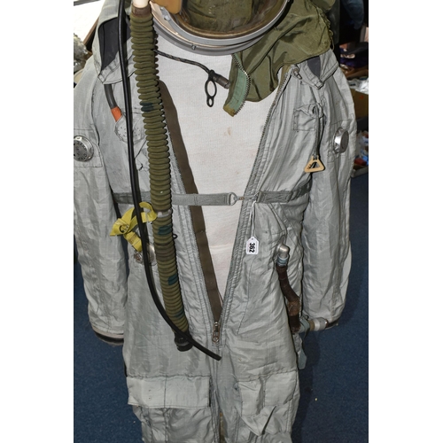 362 - A RUSSIAN MIG PILOTS FLYING SUIT AND HELMET, the helmet is signed by the pilot Alex Volkov, he went ... 