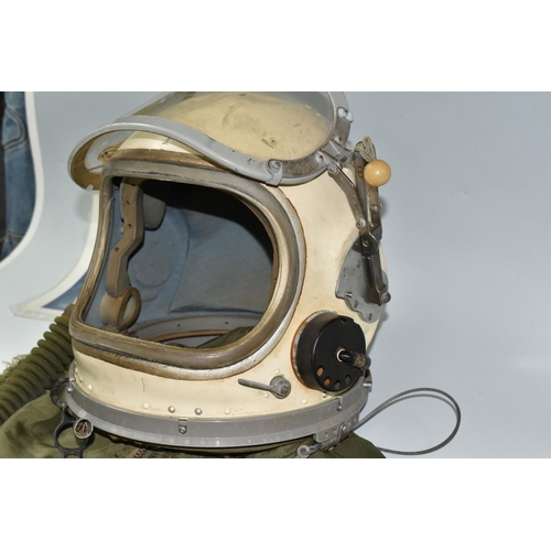 362 - A RUSSIAN MIG PILOTS FLYING SUIT AND HELMET, the helmet is signed by the pilot Alex Volkov, he went ... 