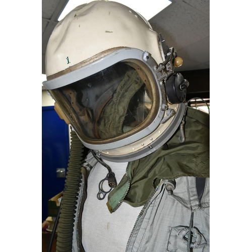 362 - A RUSSIAN MIG PILOTS FLYING SUIT AND HELMET, the helmet is signed by the pilot Alex Volkov, he went ... 