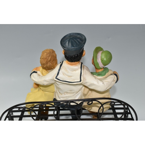 366 - A VINTAGE COMPOSITE RESIN FIGURE OF LAUREL AND HARDY as sailors on a bench with two women, (2) (Cond... 