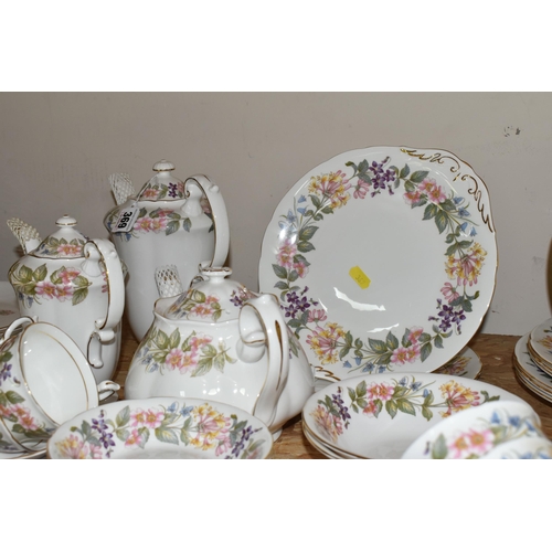 369 - A SEVENTY-EIGHT PIECE PARAGON COUNTRY LANE TEA SERVICE to include two milk jugs, one cream jug, thre... 