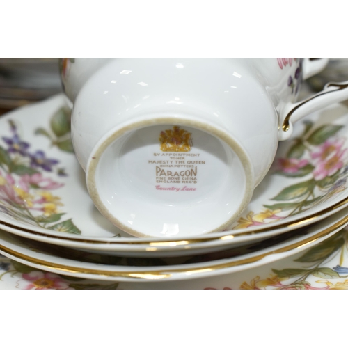 369 - A SEVENTY-EIGHT PIECE PARAGON COUNTRY LANE TEA SERVICE to include two milk jugs, one cream jug, thre... 