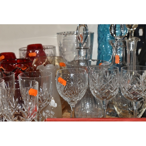 379 - A GROUP OF CLEAR AND COLOURED MOSTLY CRYSTAL CUT GLASS to include a box of six Polaris wine flutes, ... 