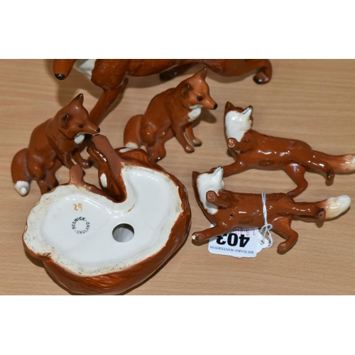 403 - SIX BESWICK FOX FIGURES, comprising Fox - Standing, model no 1016A, height 13cm, Fox - Curled no 101... 