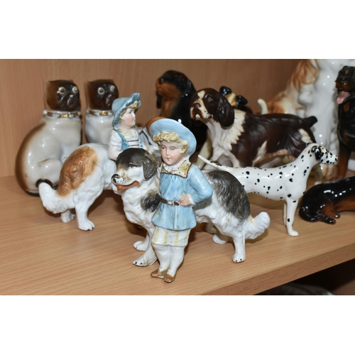 405 - A GROUP OF CERAMIC DOG FIGURES, twelve pieces comprising a large Sylvac terrier model no 1380, heigh... 