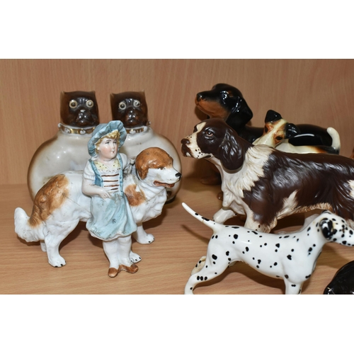 405 - A GROUP OF CERAMIC DOG FIGURES, twelve pieces comprising a large Sylvac terrier model no 1380, heigh... 