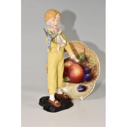 415 - A HAND PAINTED 'FALLEN FRUITS' TRINKET DISH AND A FIGURE OF A BOY, the trinket dish painted with bla... 