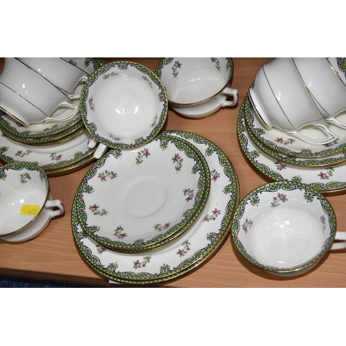 422 - A FORTY PIECE AYNSLEY A2785 TEA SET, decorated with a green border and floral sprays, comprising two... 