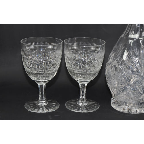 428 - A CUT CRYSTAL CLARET JUG AND FOUR GOBLETS, described by the vendor as being decorated by himself, wh... 