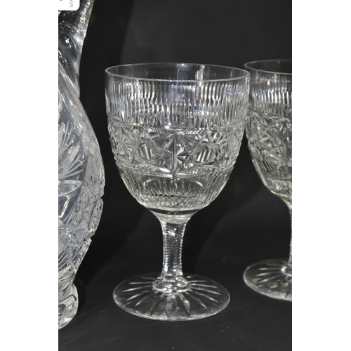 428 - A CUT CRYSTAL CLARET JUG AND FOUR GOBLETS, described by the vendor as being decorated by himself, wh... 