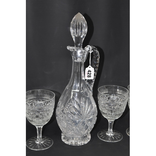 428 - A CUT CRYSTAL CLARET JUG AND FOUR GOBLETS, described by the vendor as being decorated by himself, wh... 