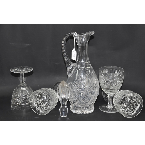 428 - A CUT CRYSTAL CLARET JUG AND FOUR GOBLETS, described by the vendor as being decorated by himself, wh... 