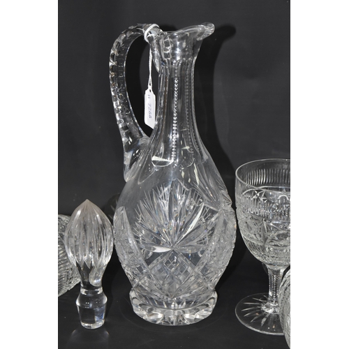 428 - A CUT CRYSTAL CLARET JUG AND FOUR GOBLETS, described by the vendor as being decorated by himself, wh... 