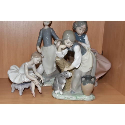 436 - A COLLECTION OF LLADRO AND NAO FIGURES, comprising Lladro: A Clean Sweep, model no 5025, sculptor Ju... 