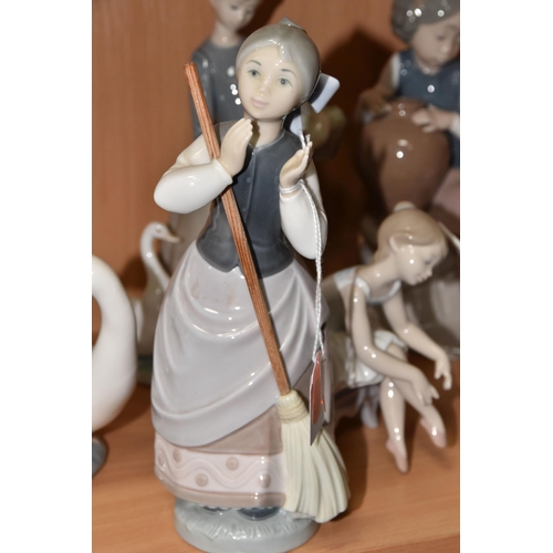 436 - A COLLECTION OF LLADRO AND NAO FIGURES, comprising Lladro: A Clean Sweep, model no 5025, sculptor Ju... 