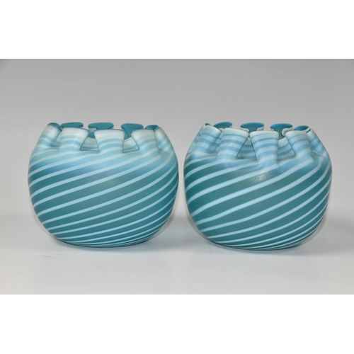 441 - A PAIR OF STOURBRIDGE BLUE SPIRAL WAVY FORM GLASS VASES, of spherical form with wavy rims, and pale ... 