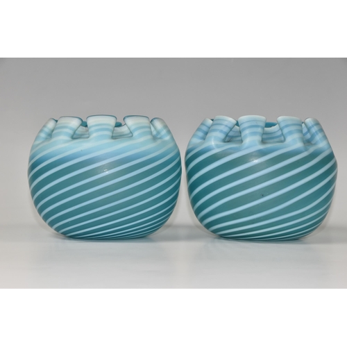 441 - A PAIR OF STOURBRIDGE BLUE SPIRAL WAVY FORM GLASS VASES, of spherical form with wavy rims, and pale ... 