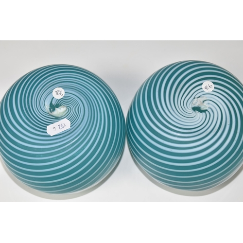 441 - A PAIR OF STOURBRIDGE BLUE SPIRAL WAVY FORM GLASS VASES, of spherical form with wavy rims, and pale ... 