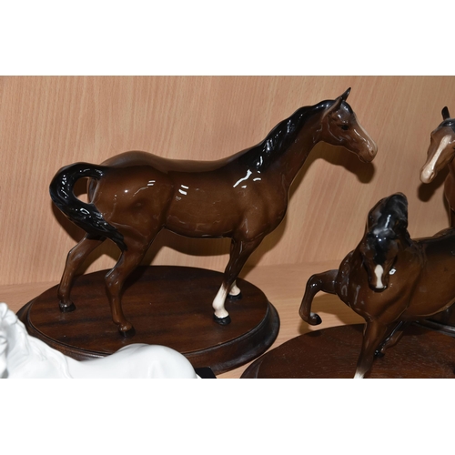 443 - A COLLECTION OF MAINLY HORSE THEMED CERAMICS, comprising a Beswick Swish Tail Horse, model no 1182, ... 