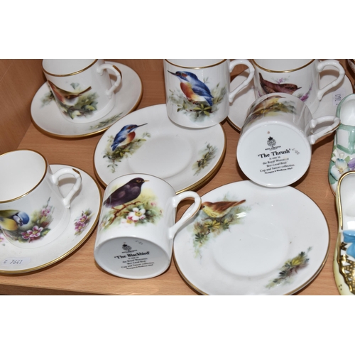 445 - A GROUP OF CERAMIC COFFEE WARE AND DECORATIVE SHOES, to include six Spode Imari Collection coffee ca... 