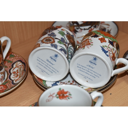 445 - A GROUP OF CERAMIC COFFEE WARE AND DECORATIVE SHOES, to include six Spode Imari Collection coffee ca... 