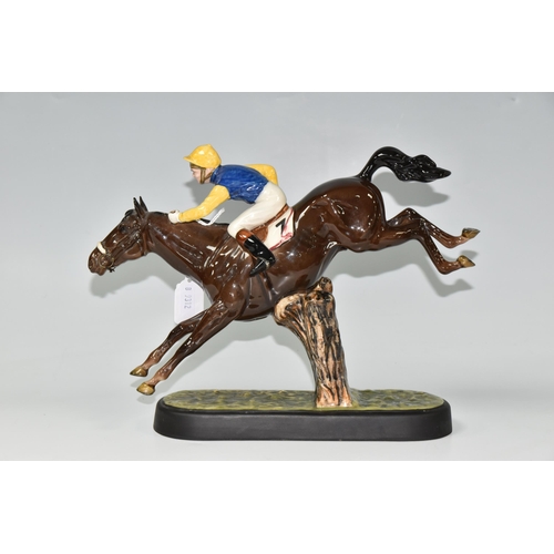 446 - A BESWICK 'STEEPLECHASER' MODEL 2505,designed by Graham Tongue, a model of a jockey and racehorse ju... 