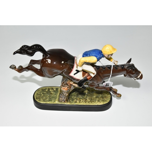 446 - A BESWICK 'STEEPLECHASER' MODEL 2505,designed by Graham Tongue, a model of a jockey and racehorse ju... 