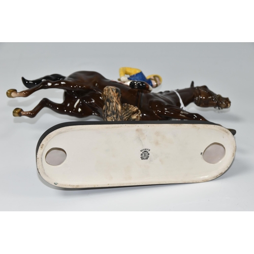 446 - A BESWICK 'STEEPLECHASER' MODEL 2505,designed by Graham Tongue, a model of a jockey and racehorse ju... 