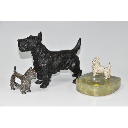 453 - THREE CAST FIGURES OF SCOTTISH AND HIGHLAND TERRIERS, comprising a green onyx ashtray/trinket dish w... 