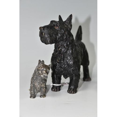 453 - THREE CAST FIGURES OF SCOTTISH AND HIGHLAND TERRIERS, comprising a green onyx ashtray/trinket dish w... 