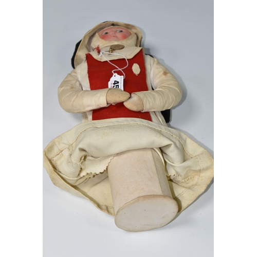 457 - A VINTAGE NURSE DOLL, painted celluloid face which has some paint loss, crush damage to nose and wea... 